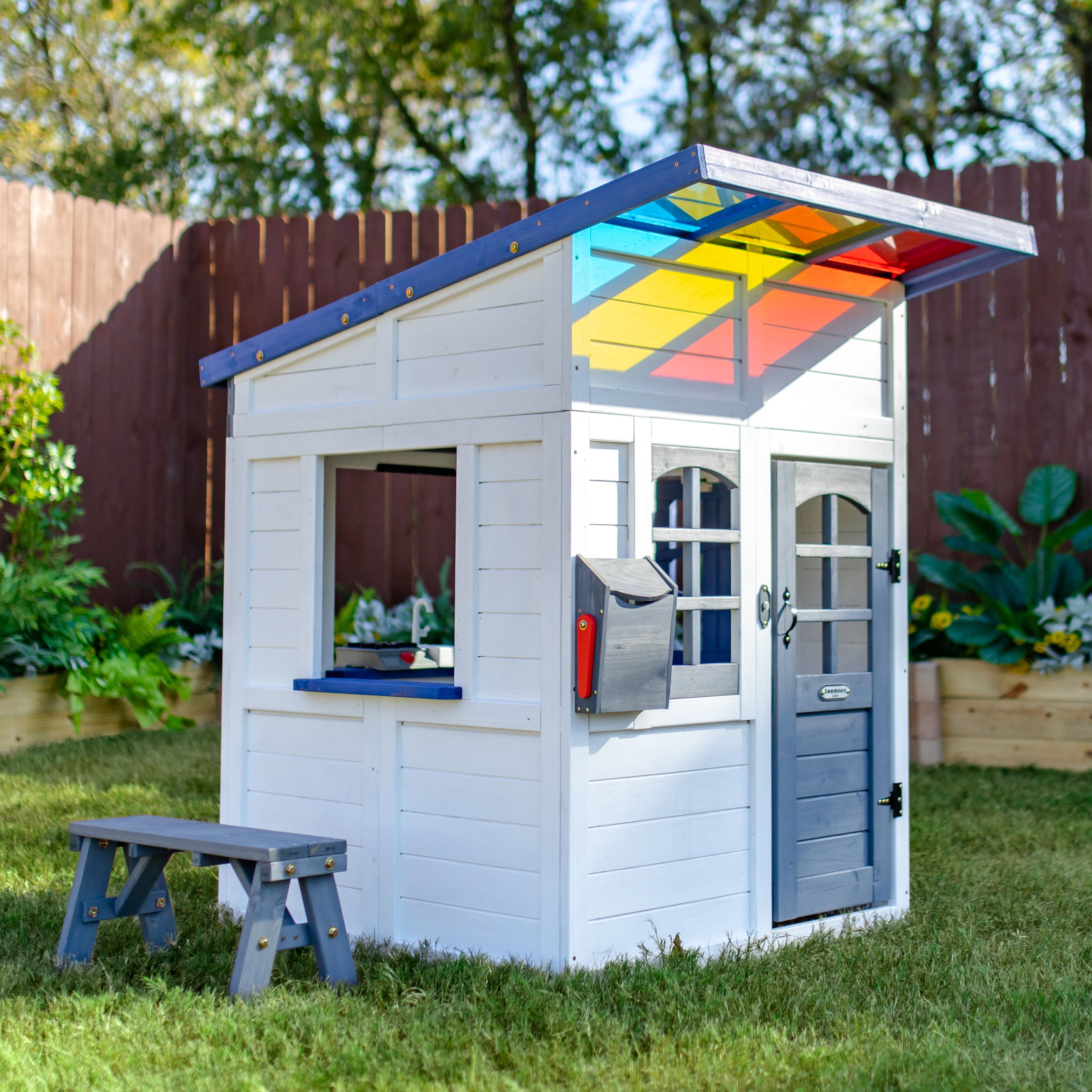 Teamson Kids Wooden Outdoor Playhouse with Interactive Kitchen, Bench, Flower Box and Colorful Roof Panels for Backyard Play