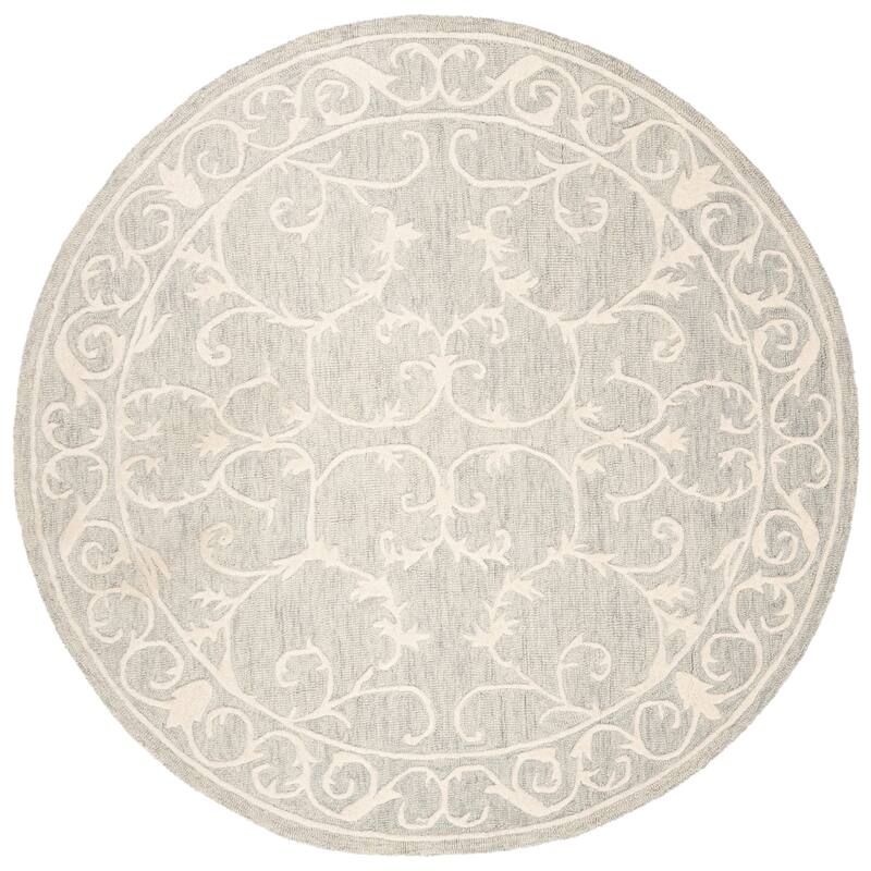 SAFAVIEH Handmade Micro-Loop Tomke Wool Rug