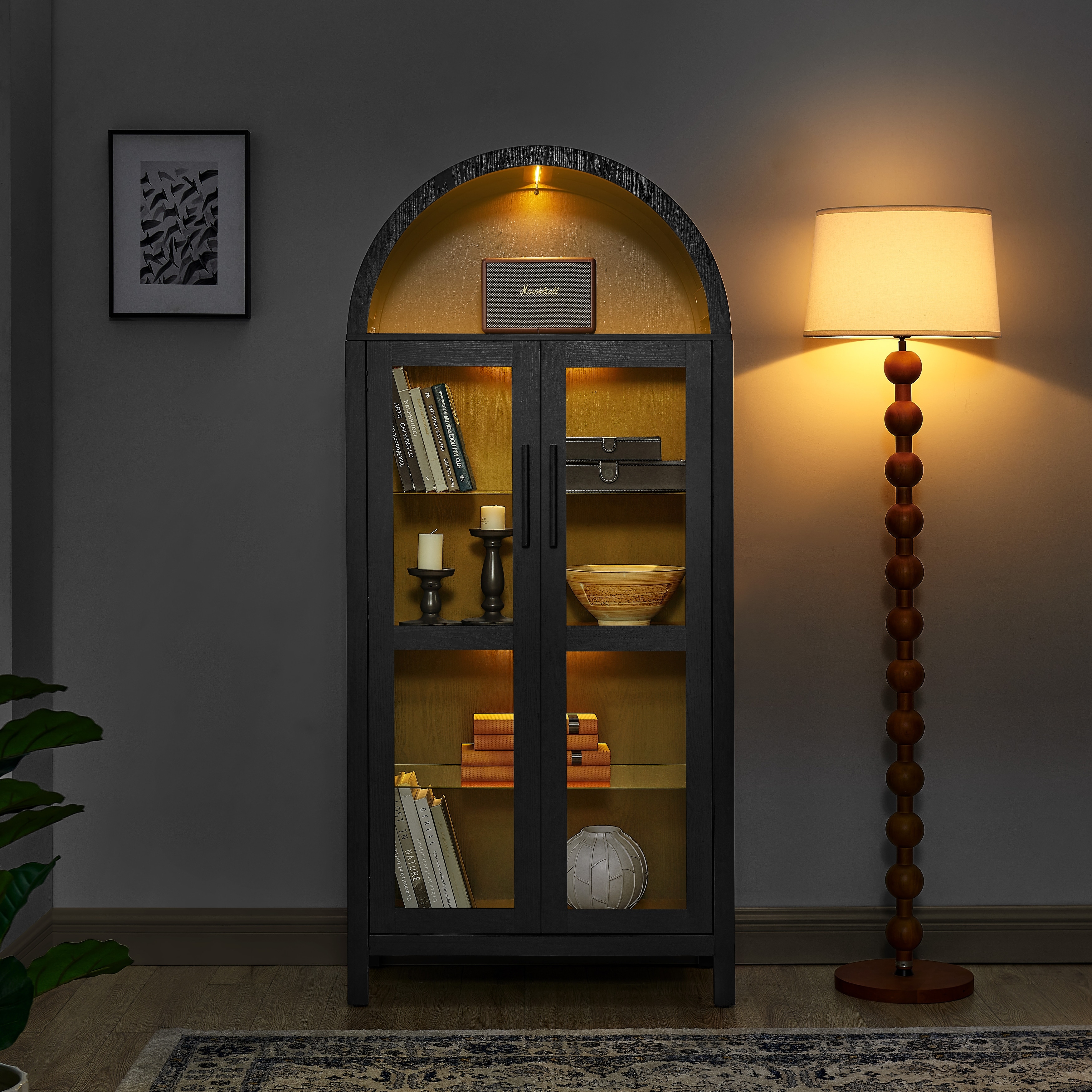 A high arched storage cabinet with a lamp, a modern retro-style wooden storage cabinet with adjustable glass partitions
