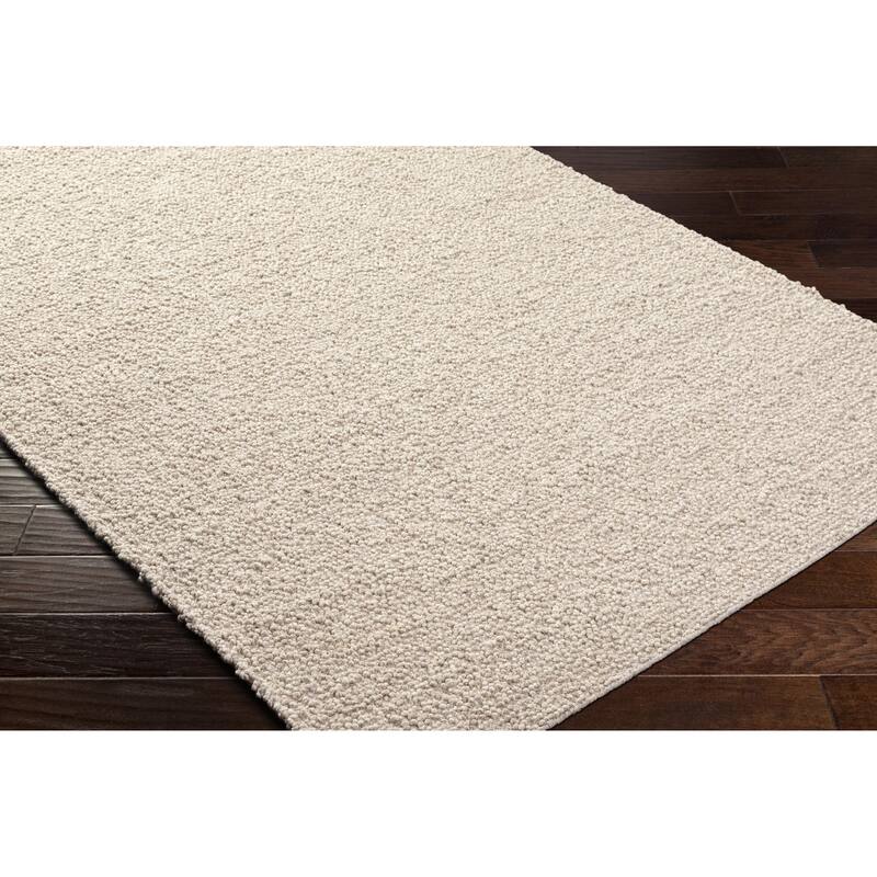 Juwan Mid-Century Modern Solid Area Rug