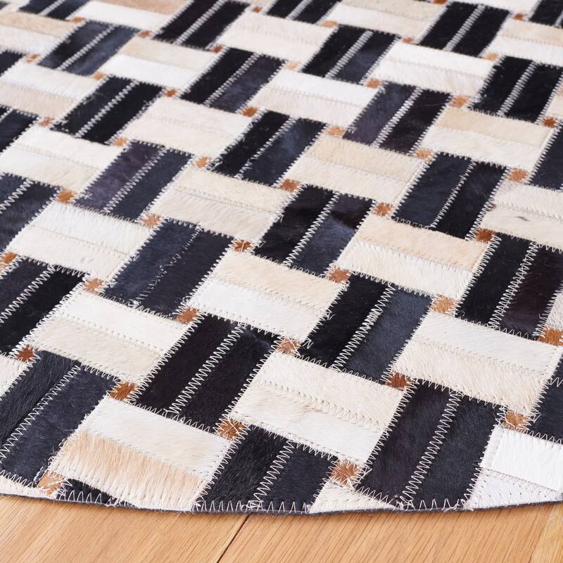 SAFAVIEH Handmade Studio Leather Shawanda Mid-Century Modern Rug