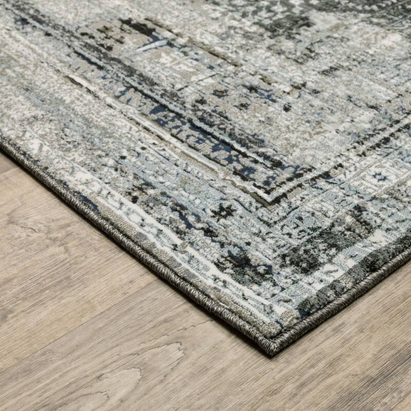 4' X 6' Charcoal Grey Blue Ivory And Taupe Oriental Power Loom Stain Resistant Area Rug 3'6