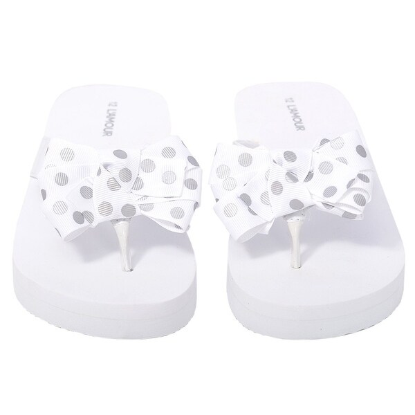 girls white flip flops