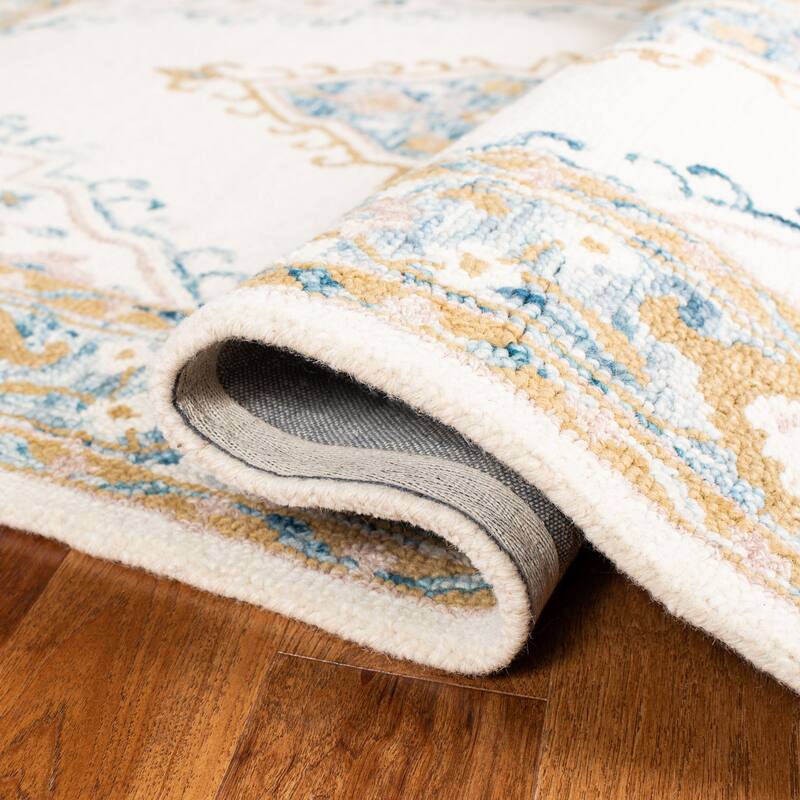 SAFAVIEH Handmade Micro-Loop Taimi Modern Wool Rug