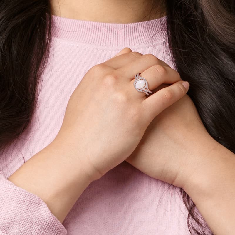 Miadora 10k Rose Gold Oval-cut Opal and 1/6ct TDW Diamond Halo Split Shank Engagement Ring