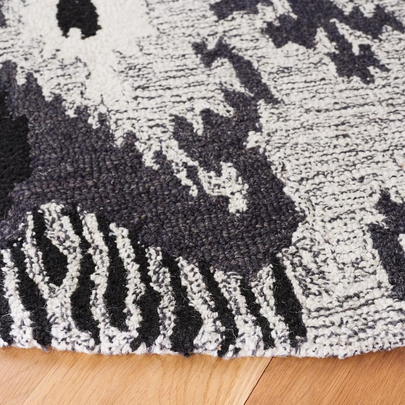 SAFAVIEH Handmade Ikat Engeltje Bohemian Wool Rug