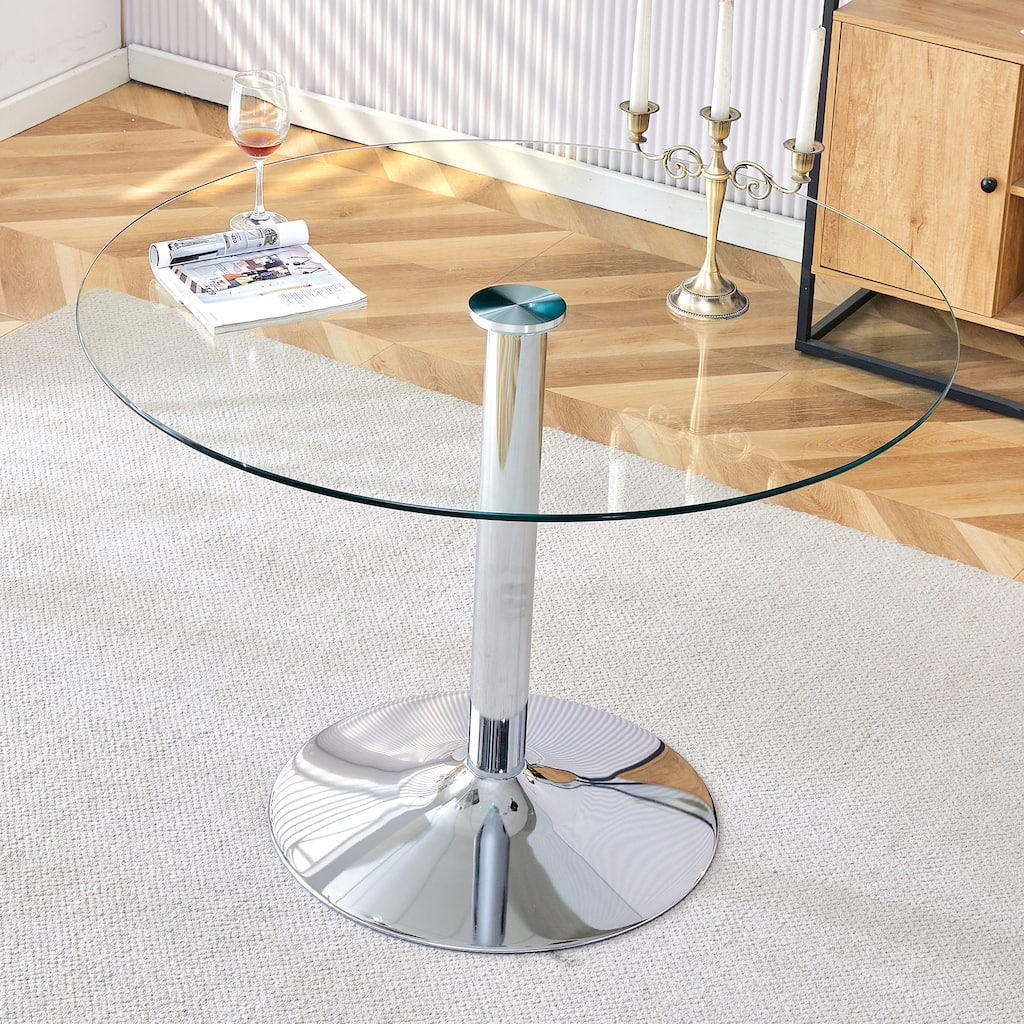 A glass tabletop with a diameter of 39.7 inches and a modern minimalist circular dining table with electroplated metal legs