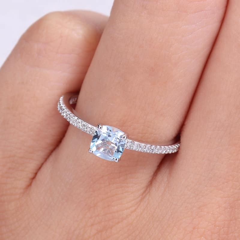 Miadora 10k White Gold Cushion-cut Blue Topaz and 1/10ct TDW Diamond Birthstone Ring