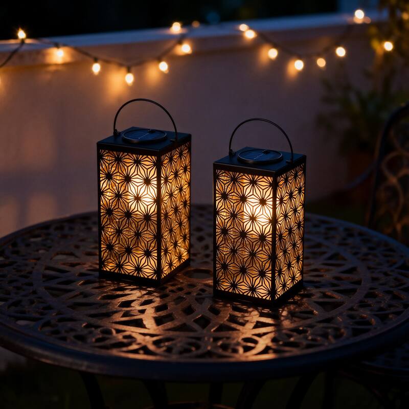 Glitzhome 11"H Black Metal Cutout or Square Textured Glass Pattern Solar Powered Hanging Lantern with LED Light - 2PK-Cutout Pattern