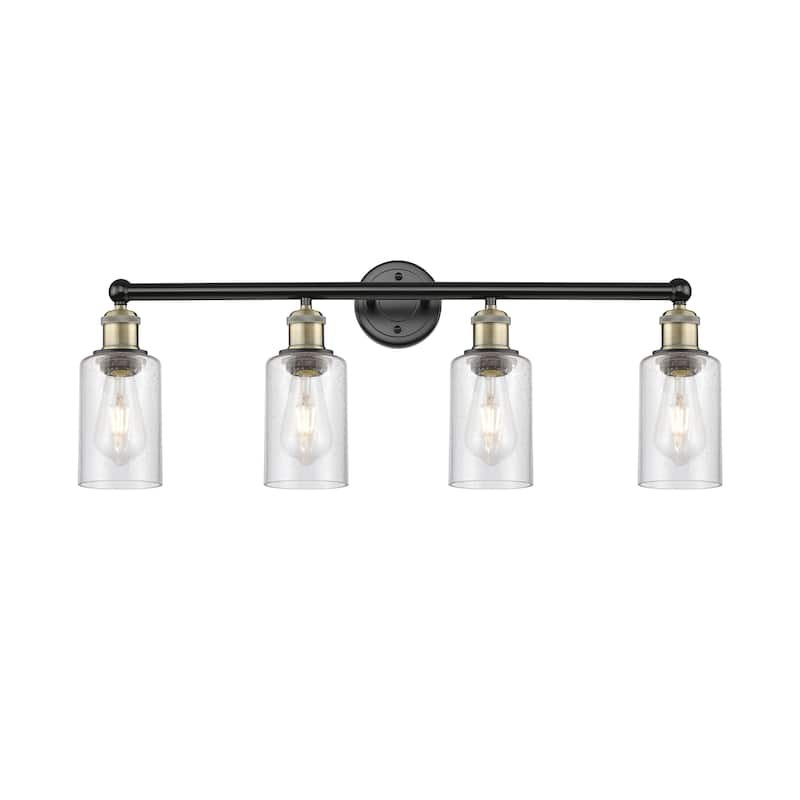 Innovations Lighting Clymer - 4 Light 31" Bath Vanity Light - Black Antique Brass/Seedy