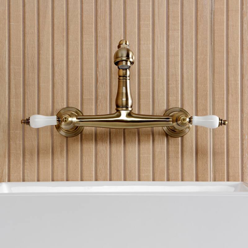 Kingston Brass English Country Two-Handle 2-Hole Wall Mount Bathroom Faucet