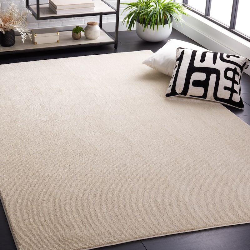 SAFAVIEH Revive Avie Solid Rug - 5'3" x 7'7" - Ivory