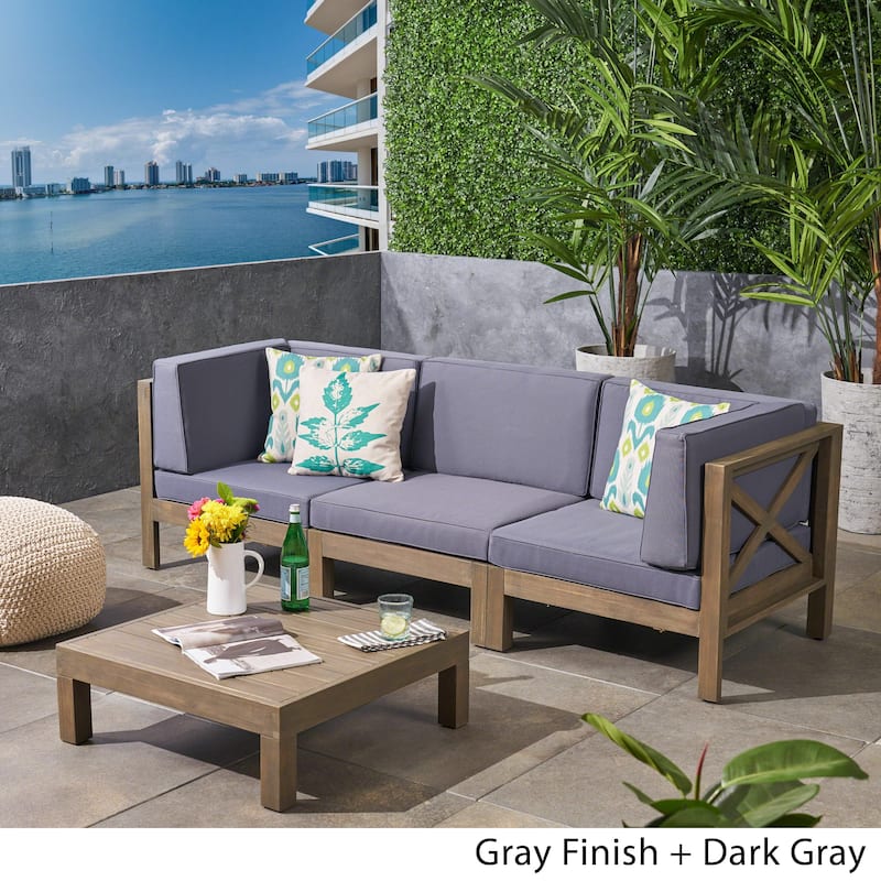 Brava Outdoor 3-Seater Acacia Wood Sectional Sofa Set with Coffee Table and Cushions by Christopher Knight Home