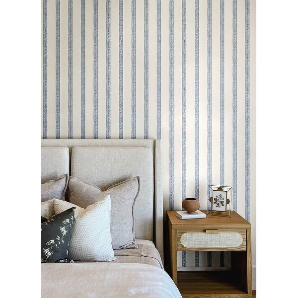 blue striped wallpaper bedroom