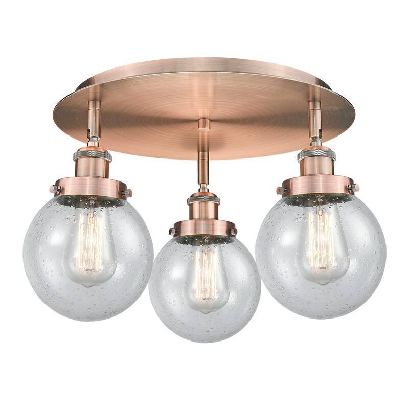 Innovations Lighting Beacon - 3 Light 18" Flush Mount - Antique Copper/Seedy