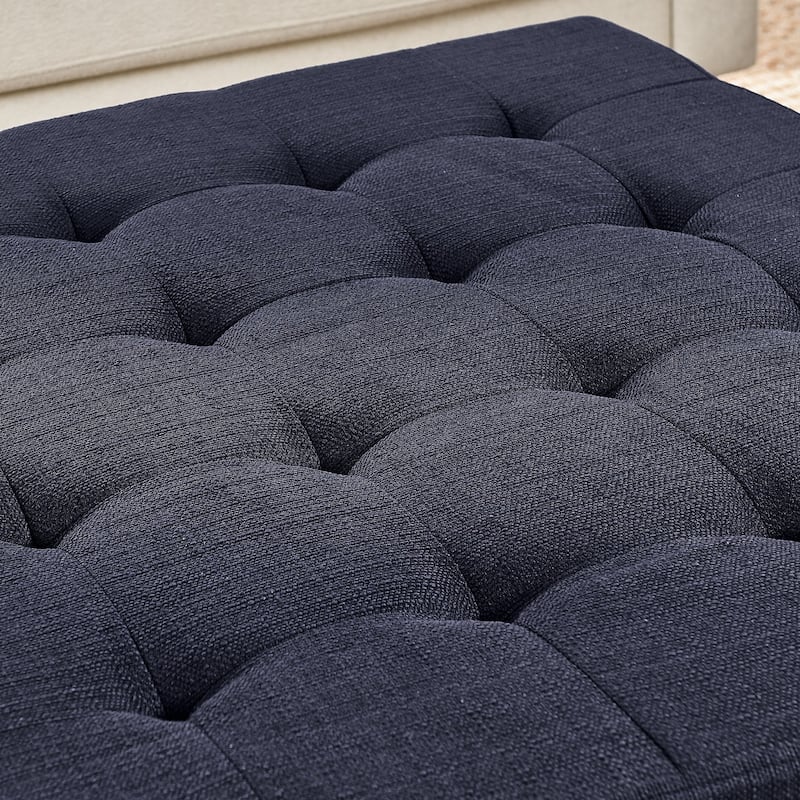 Coffee table with tufted linen upholstery