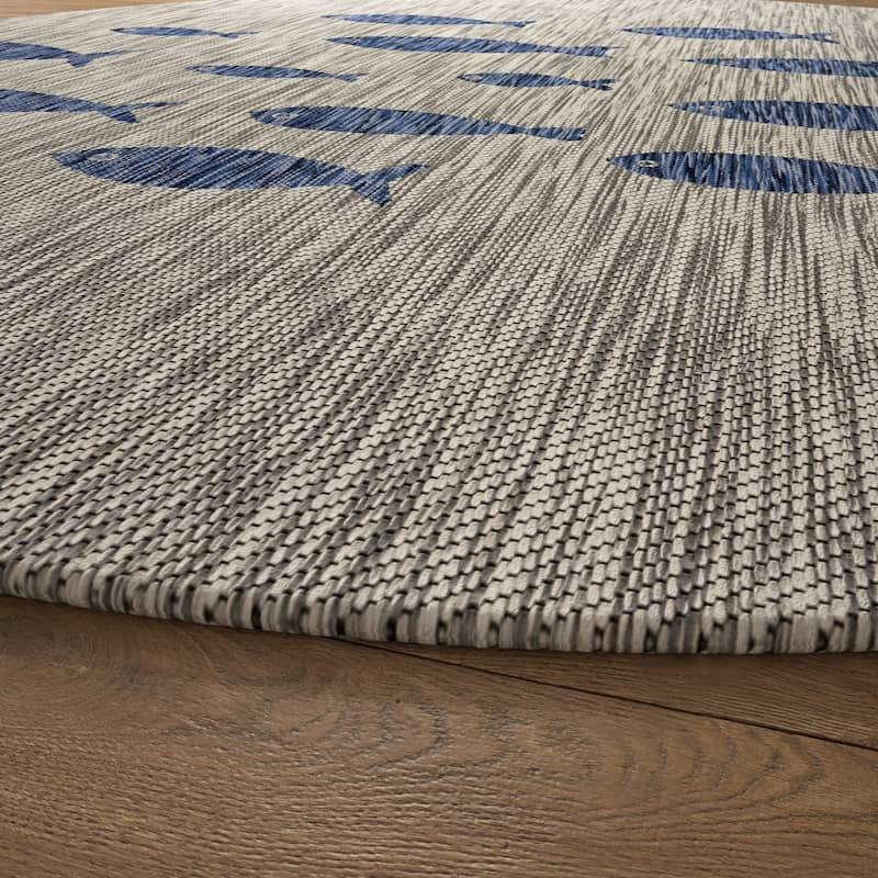 Isola Tropical Indoor/Outdoor Area Rug by Porch & Den