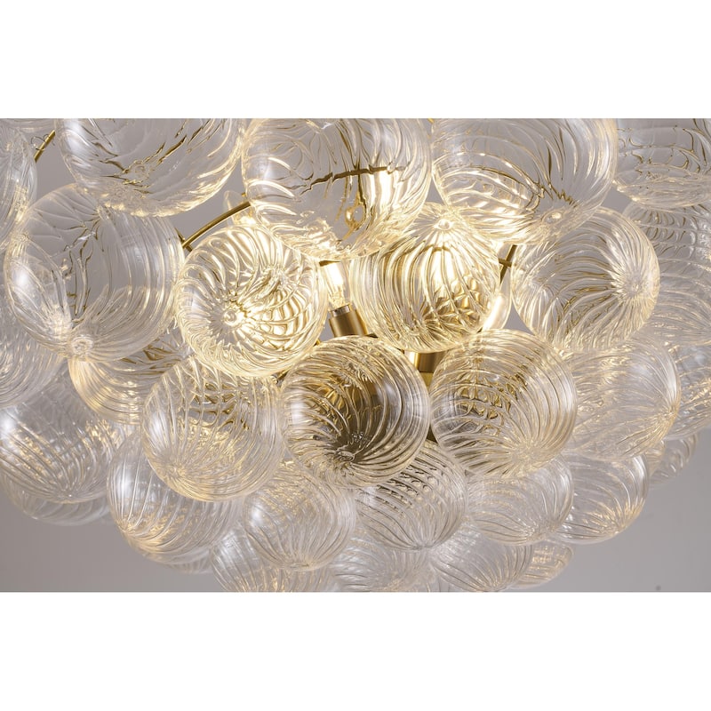 12-Light Brass Chandelier With Clear Swirl Glass Accents