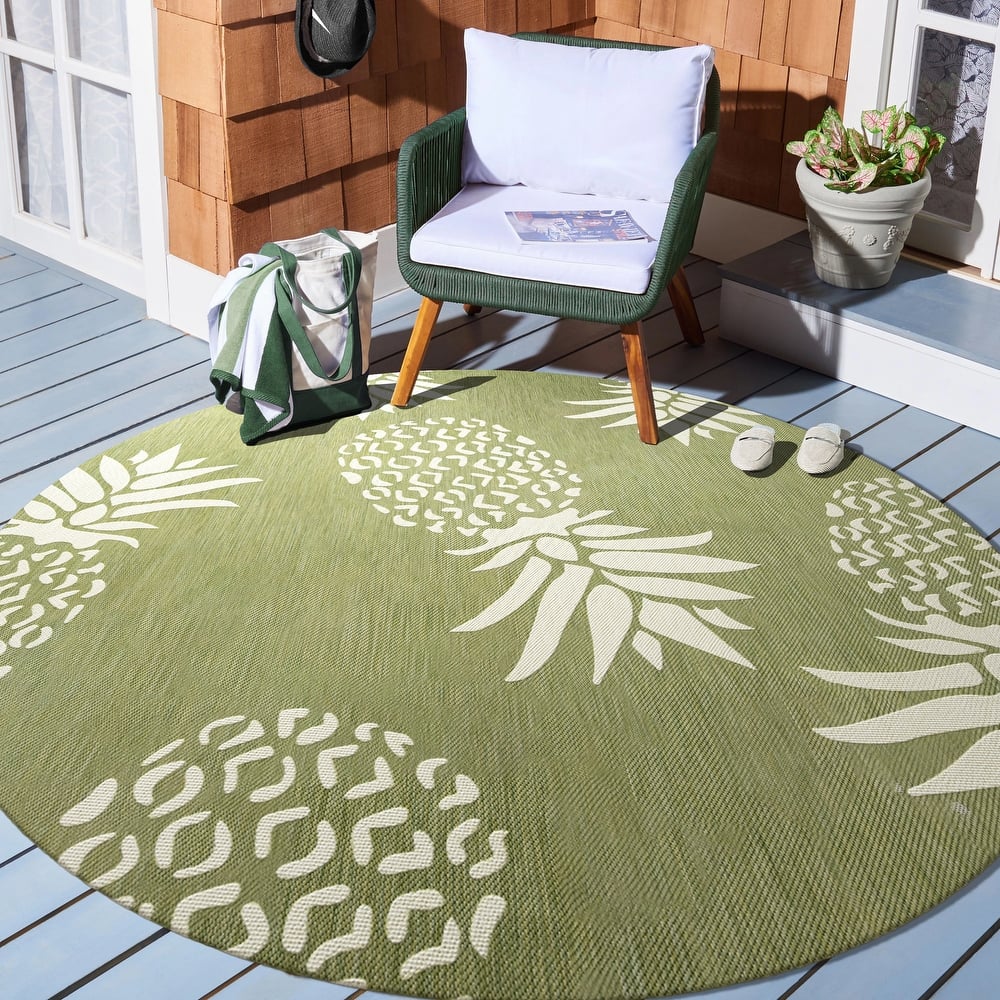 Isola Tropical Indoor/Outdoor Area Rug by Porch & Den