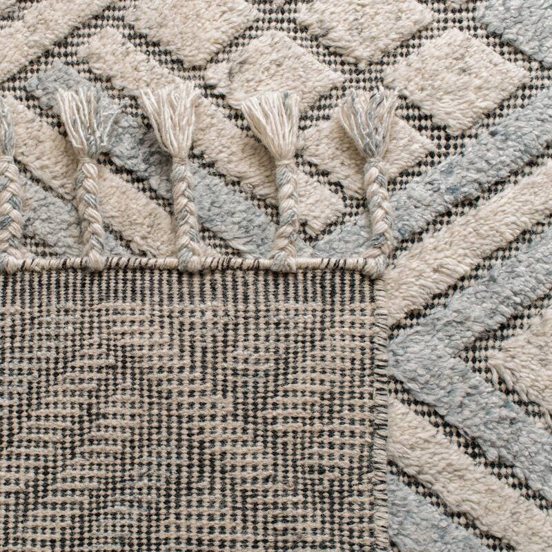 SAFAVIEH Hand-Knotted Casablanca Shag Aurane Tribal Wool Rug
