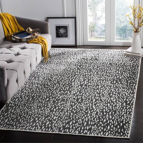SAFAVIEH Handmade Marbella Sunetra Modern Polyester Rug. Opens flyout.