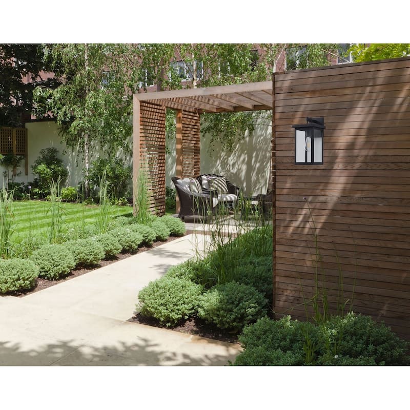 1-Light Matte Black Outdoor Wall Sconce With A Clear Glass Shade