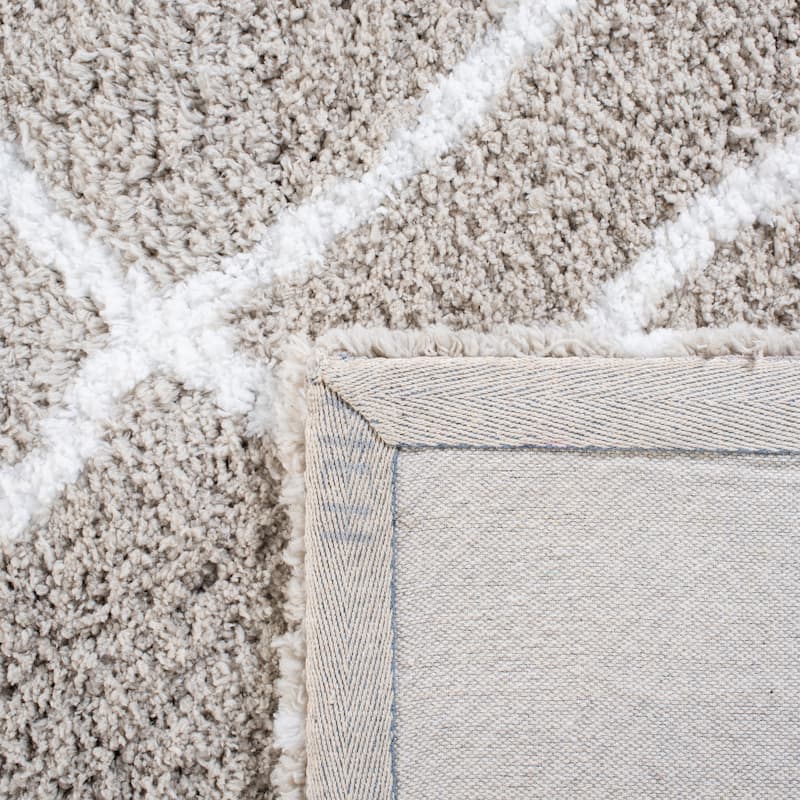 SAFAVIEH Handmade Toronto Shag Shaniqua Polyester Rug