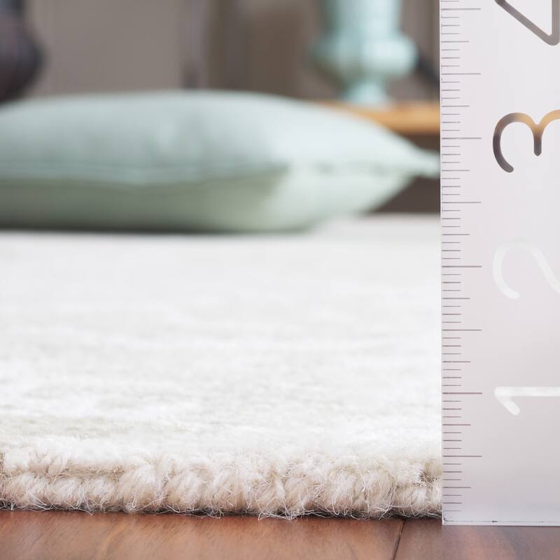 SAFAVIEH Handmade Ebony Afifa Modern & Contemporary Wool Rug