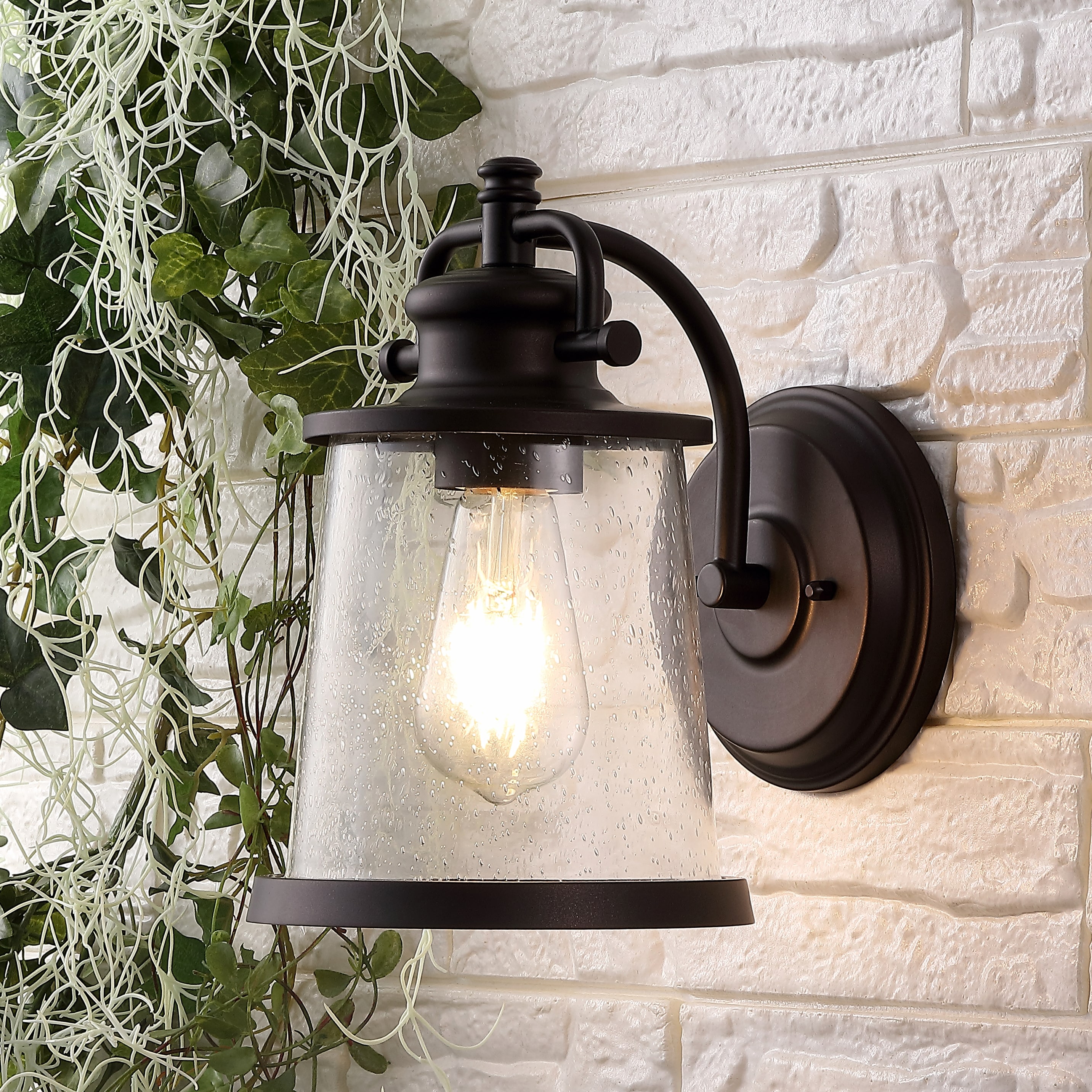 JONATHAN Y Marais 6.75" Iron/Seeded Glass Vintage Rustic LED Outdoor Lantern, Oil Rubbed Bronze