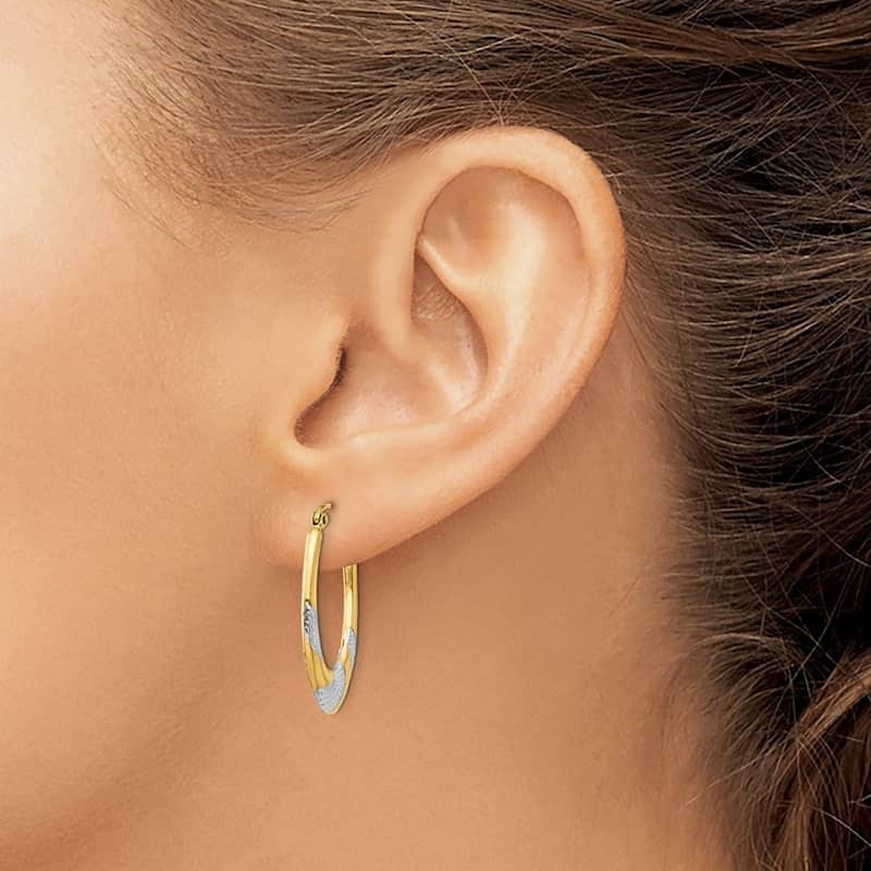 Curata 14k Yellow Gold and Rhodium 3x25mm Textured Oval Hoop Earrings