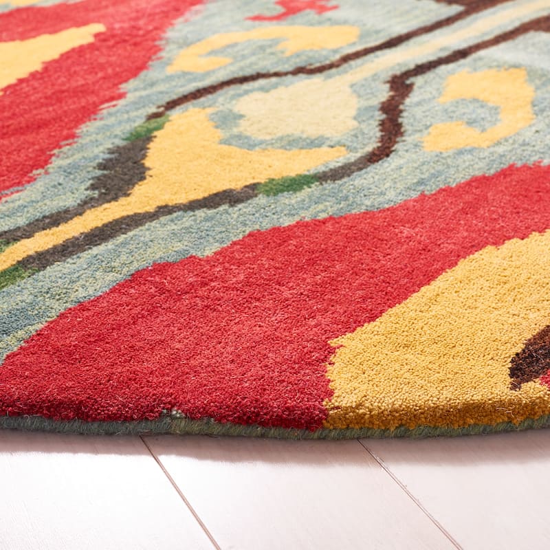 SAFAVIEH Handmade Ikat Meliha Modern Wool Rug