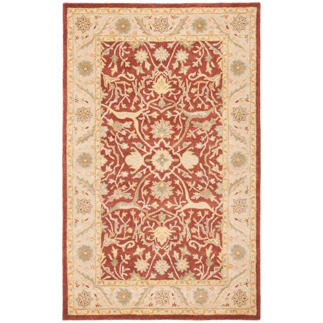SAFAVIEH Handmade Antiquity Izora Traditional Oriental Wool Rug - 4' x 6' - Rust