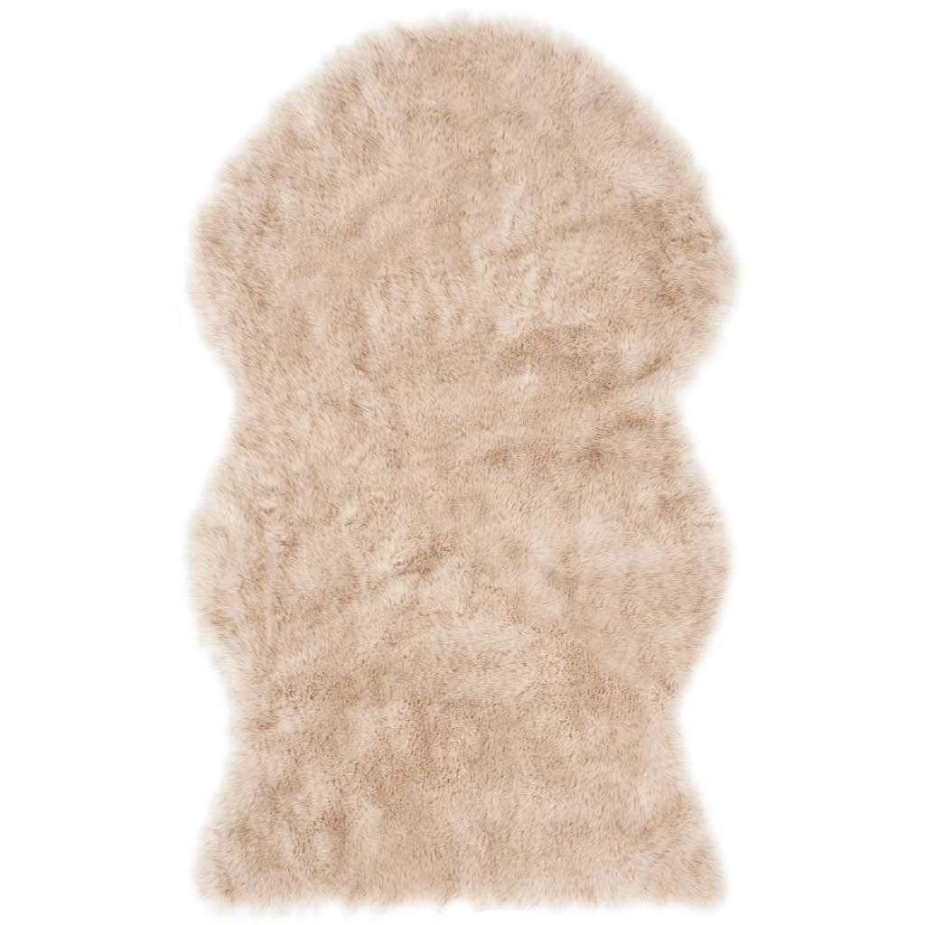 SAFAVIEH Faux Sheep Nessa Tawanda Shag Solid Rug