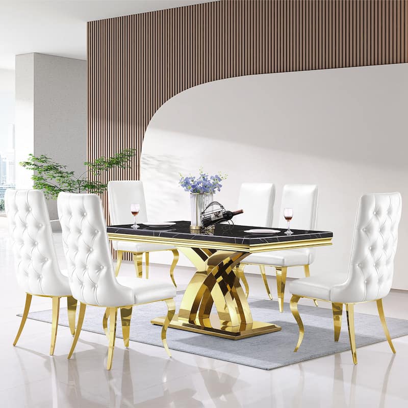 White leather dining chairs with gold legs