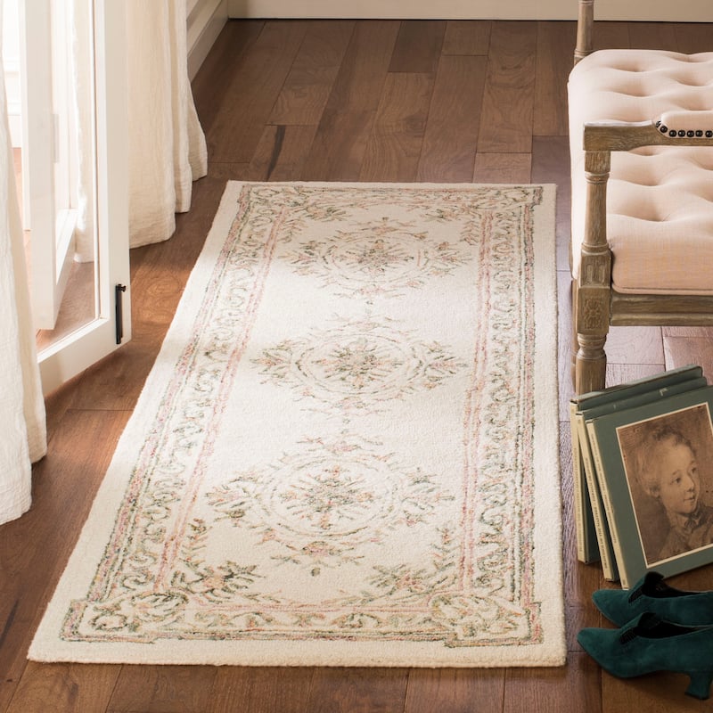SAFAVIEH Handmade Micro-Loop Lelouda Wool Rug - 2'3" x 7' Runner - Ivory/Fuchsia