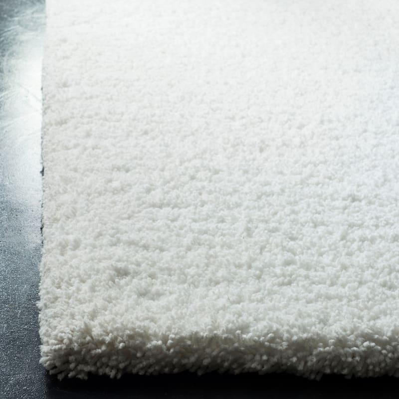 SAFAVIEH Handmade Ultimate Shag Martika Solid Polyester Rug