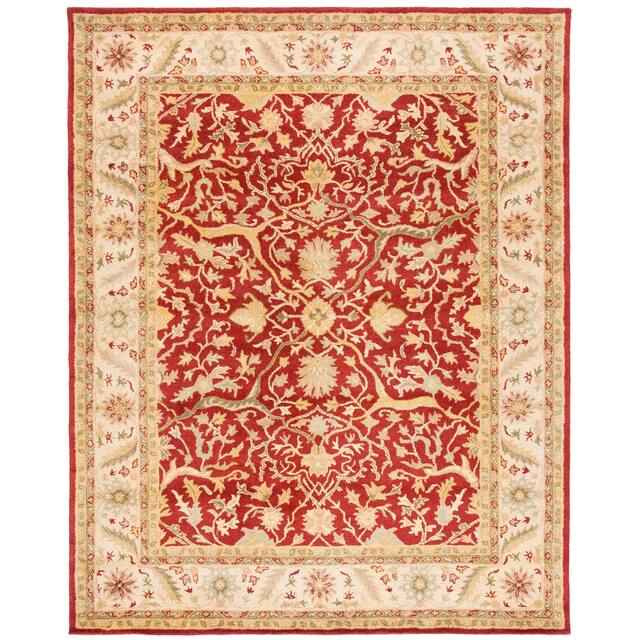 SAFAVIEH Handmade Antiquity Izora Traditional Oriental Wool Rug - 6' x 9' - Rust