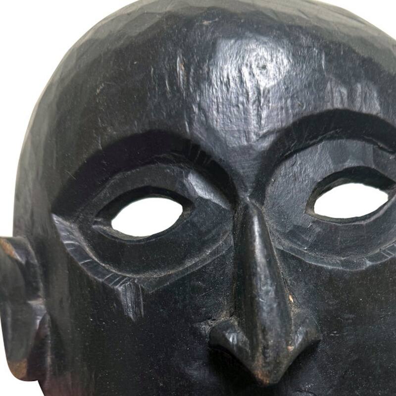 HomeRoots 11" Black Solid Wood Decorative Mask Tabletop Sculpture - 11" H