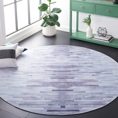 SAFAVIEH Faux Hide Machine Washable Slip Resistant Basanti Modern Abstract Rug