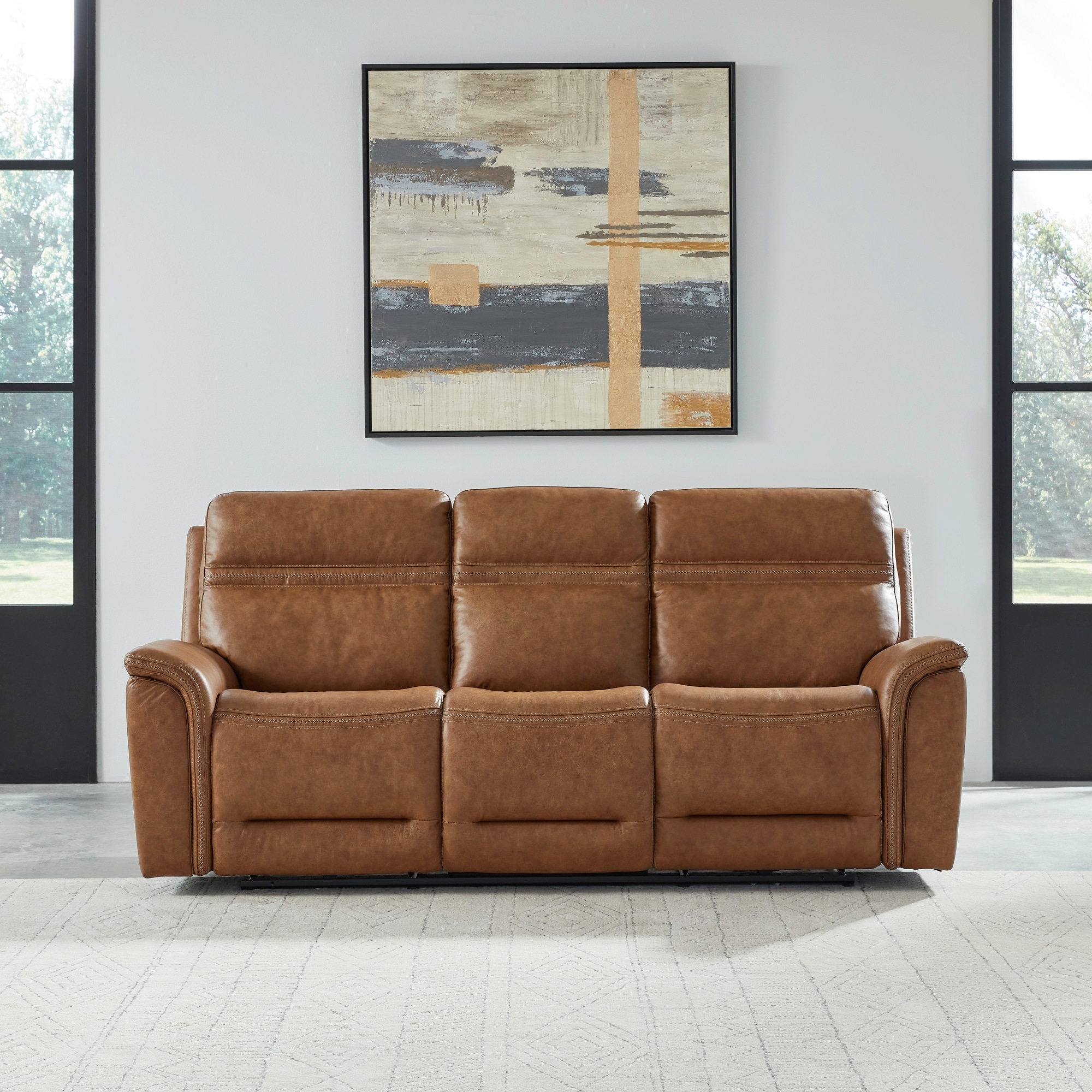 Camel leather reclining clearance sofa
