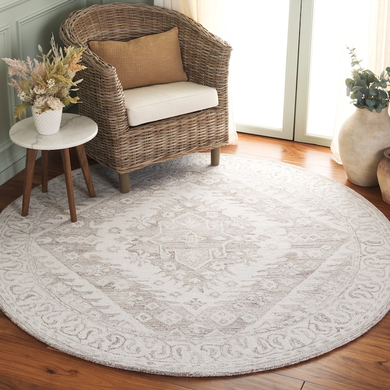 SAFAVIEH Handmade Ebony Domitilia Wool Rug - 6' Round - Beige/Ivory