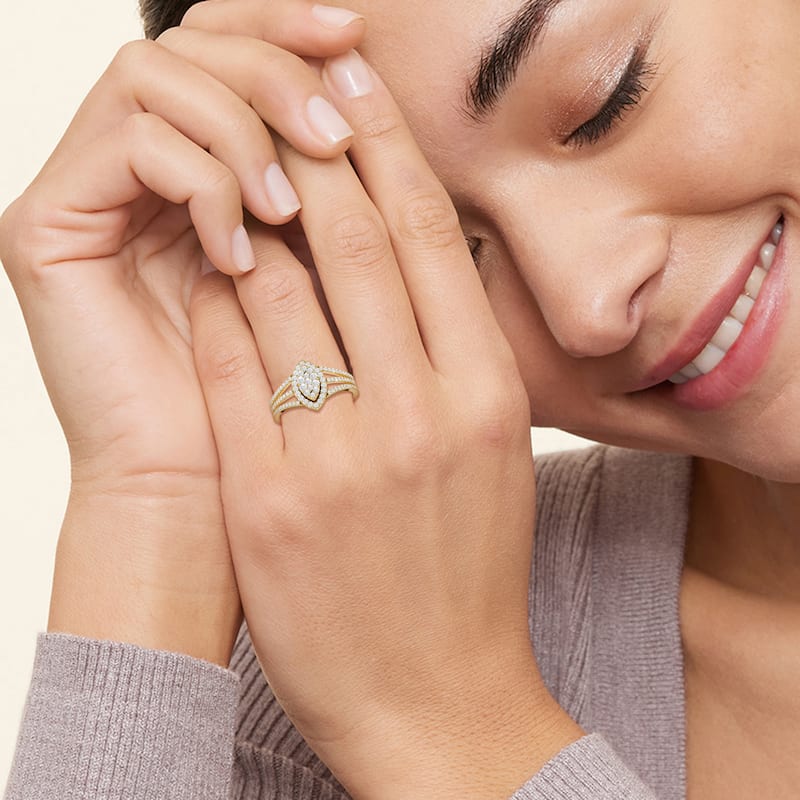 1/2ct TDW Diamond Marquise Framed Cluster Halo Engagement Ring in 10K Yellow Gold for Women