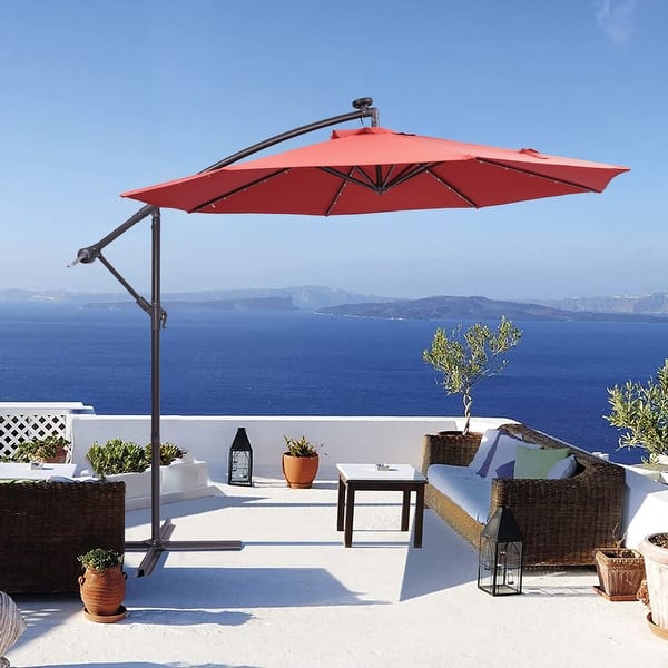 fade resistant patio umbrella with lights BLUU 12 FT Solar Cantilever LED Aluminum Offset Umbrella 15 Strip and Center light, Recycled Fabric 36 Month Resistance, The sleek Ovios 10FT Patio Umbrella with
