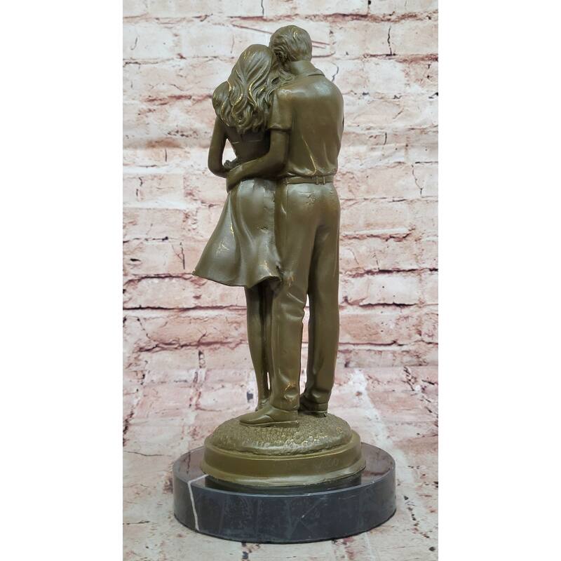 Bronze Sculpture Of Young Family Holding Newborn Baby By Milo
