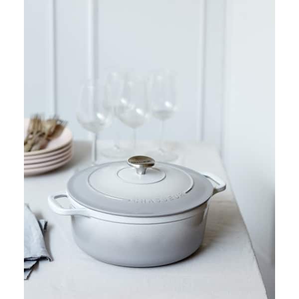 https://ak1.ostkcdn.com/images/products/is/images/direct/63f7b4784c1d943809f395b0a0d0a2fcadec3511/Chasseur-French-Enameled-Cast-Iron-Round-Dutch-Oven%2C-2.6-quart.jpg?impolicy=medium