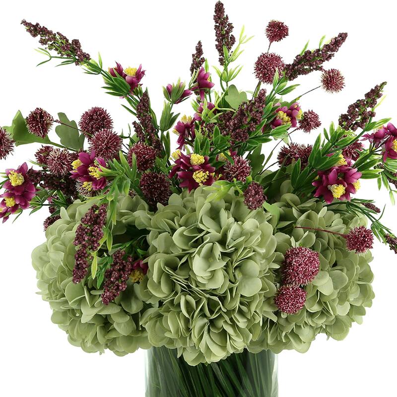 Hydrangeas and Heather Arranged in a Glass Vase with Grass