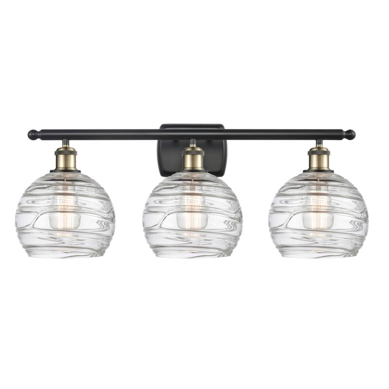 Innovations Lighting Deco Swirl 3 Light 26" Wide Bathroom Vanity Light - Black Antique Brass / Clear