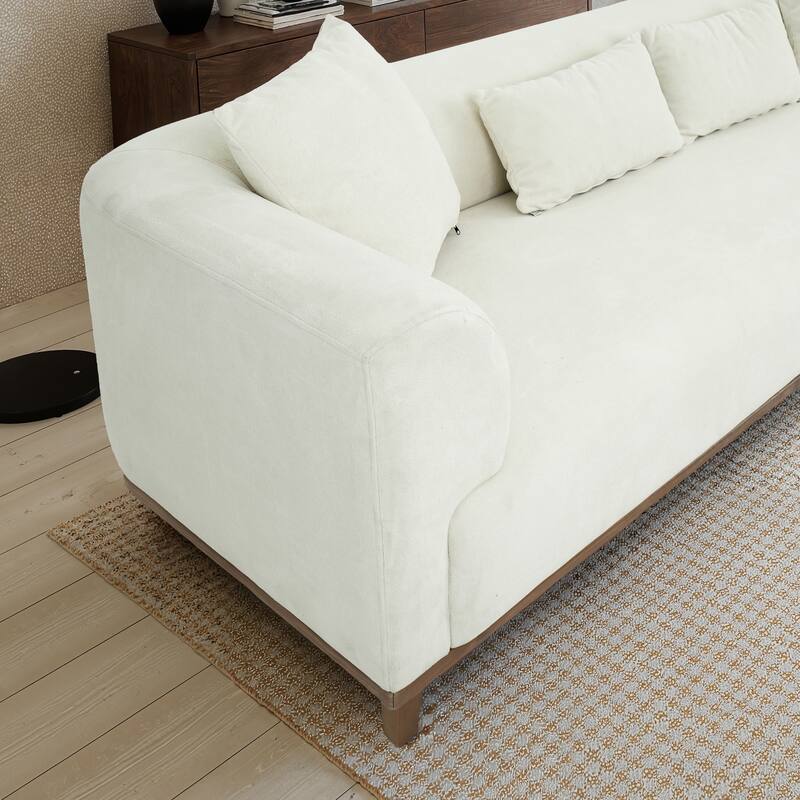 Zalma Three-Seater Velvet Sofa with Loose Pillows and Solid Wood Legs