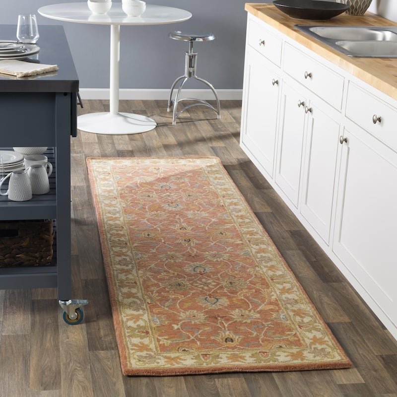 Livabliss Caesar Updated Traditional Border Area Rug. - 2'6" x 8' - Rust