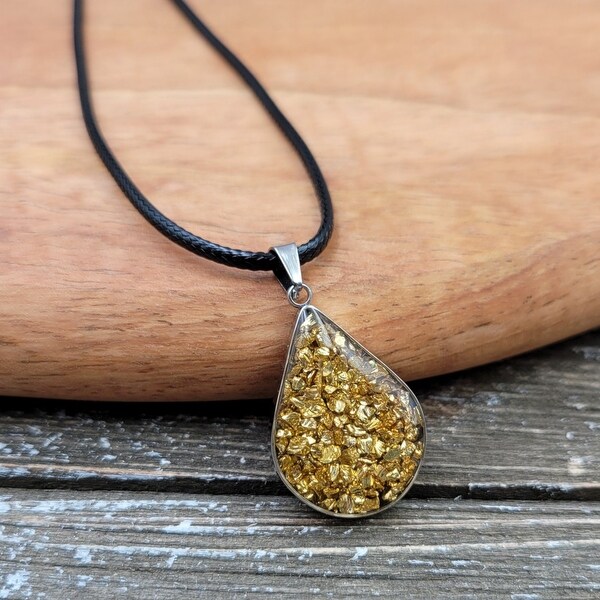 Gold Pyrite stone captured in Resin Teardrop Pendant Necklace. Opens flyout.